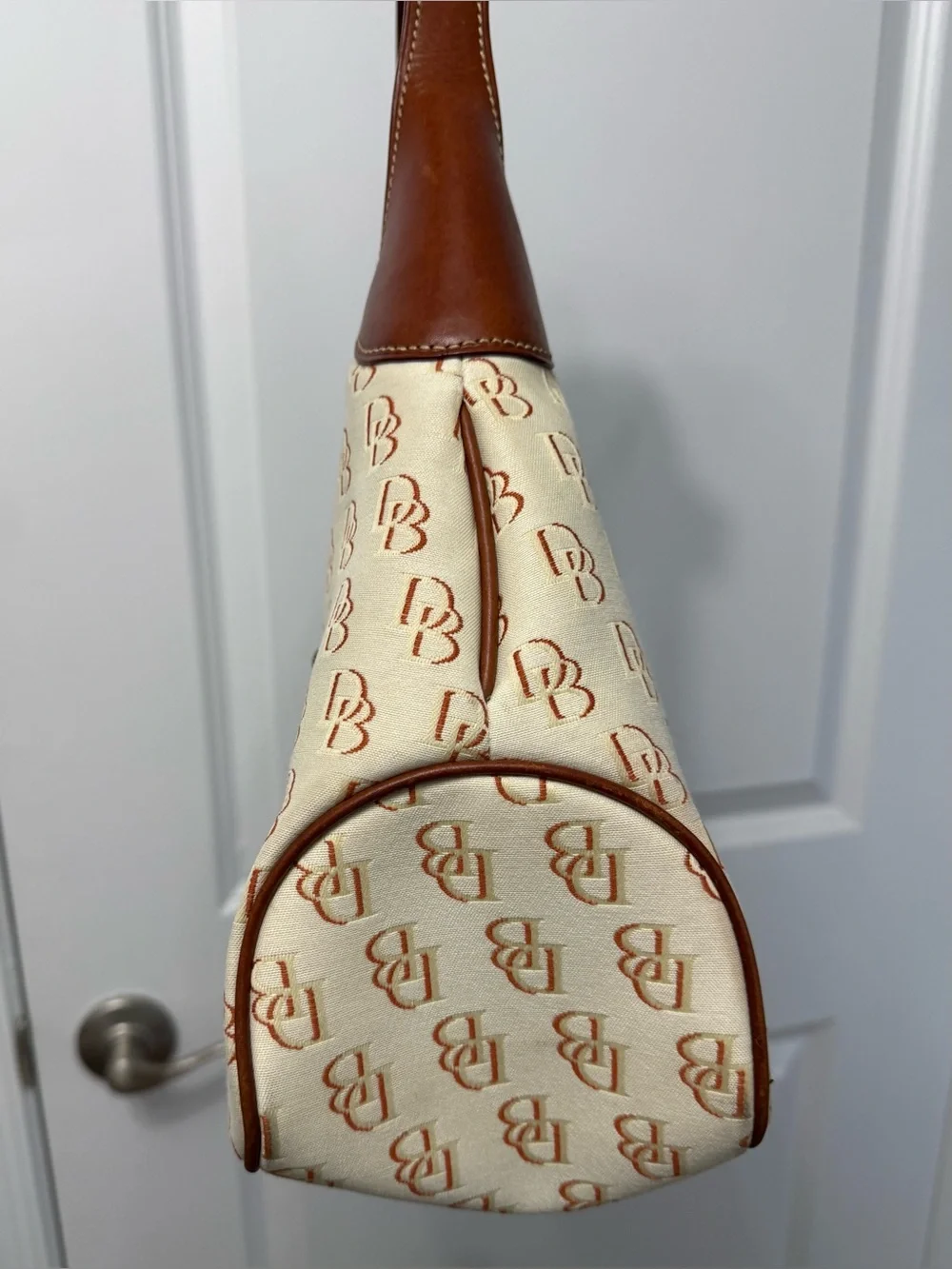 Dooney & Bourke Cream/Brown Signature Logo Lock Canvas Hobo Shoulder Bag